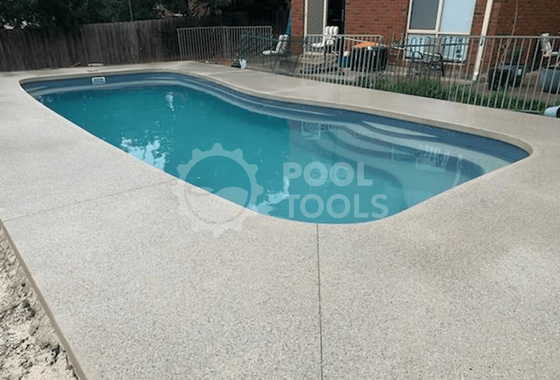Pool Tools project - Inground pool with concrete deck in a backyard setting